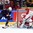 HELSINKI, FINLAND - DECEMBER 31: USA's Nick Schmaltz #9 battles for the puck with Denmark's Mathias Lassen #5 in front of Mathias Seldrup #1 during preliminary round action at the 2016 IIHF World Junior Championship. (Photo by Matt Zambonin/HHOF-IIHF Images)

